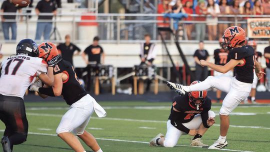 Bulldogs Take Bite Out Of Bombers; Hand Macomb High School 1st Loss