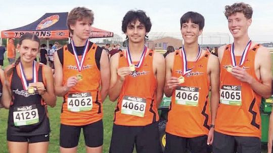 MHS Boys Race Way To Prairieland Title; Girls Second