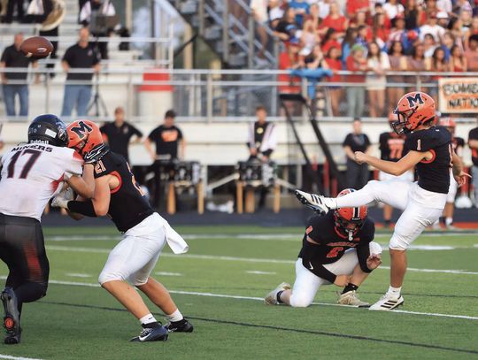 Bulldogs Take Bite Out Of Bombers; Hand Macomb High School 1st Loss
