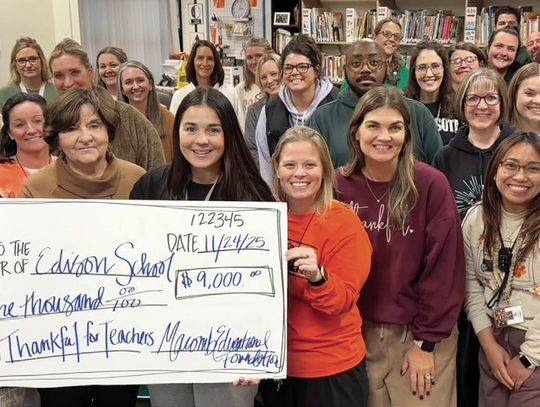 Donation from MEF Aides Macomb Schools