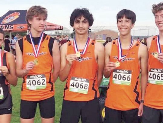MHS Boys Race Way To Prairieland Title; Girls Second