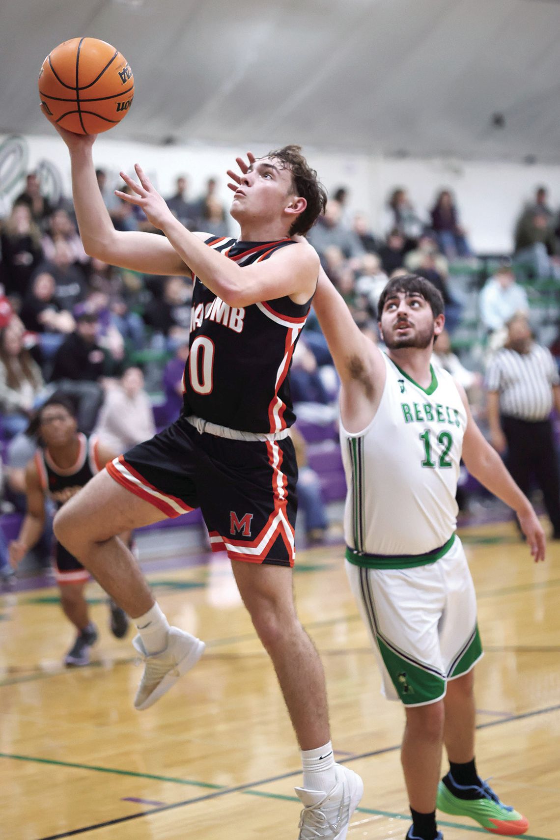 Bombers Glide Closer To Division Title With 59-28 Win