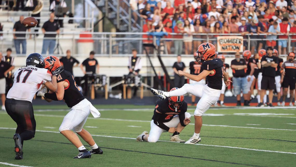 Bulldogs Take Bite Out Of Bombers; Hand Macomb High School 1st Loss