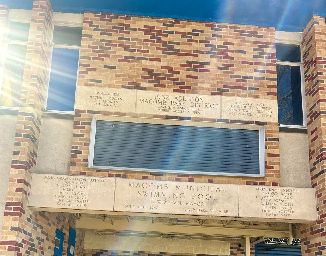 Signage on Glenwood Pool building indicating construction details