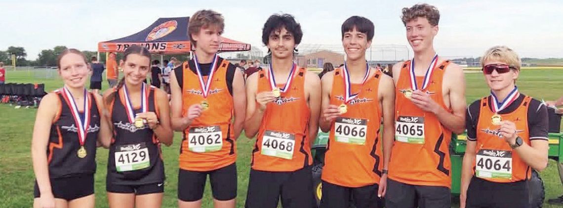 MHS Boys Race Way To Prairieland Title; Girls Second